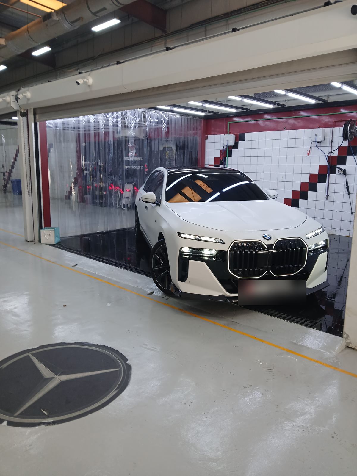 White BMW at the Velokar workshop in Al Quoz, Dubai