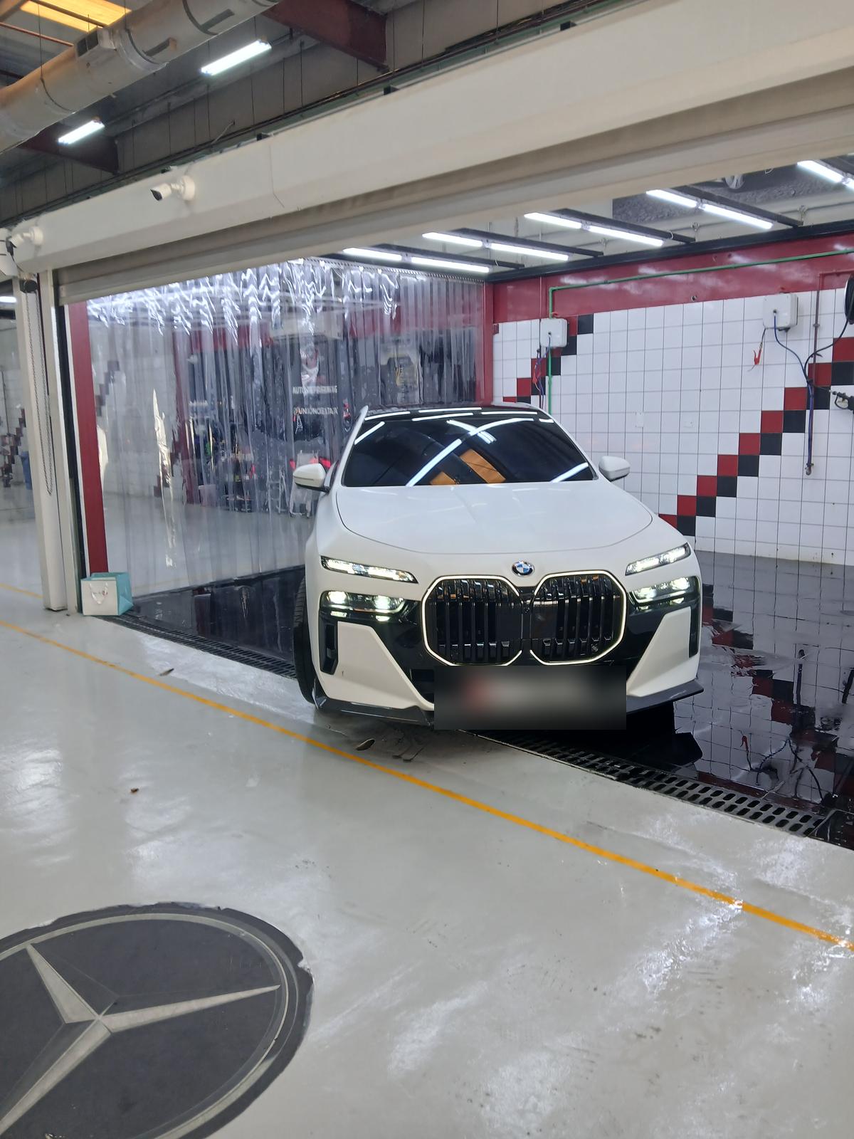 White BMW at the Velokar workshop in Al Quoz, Dubai
