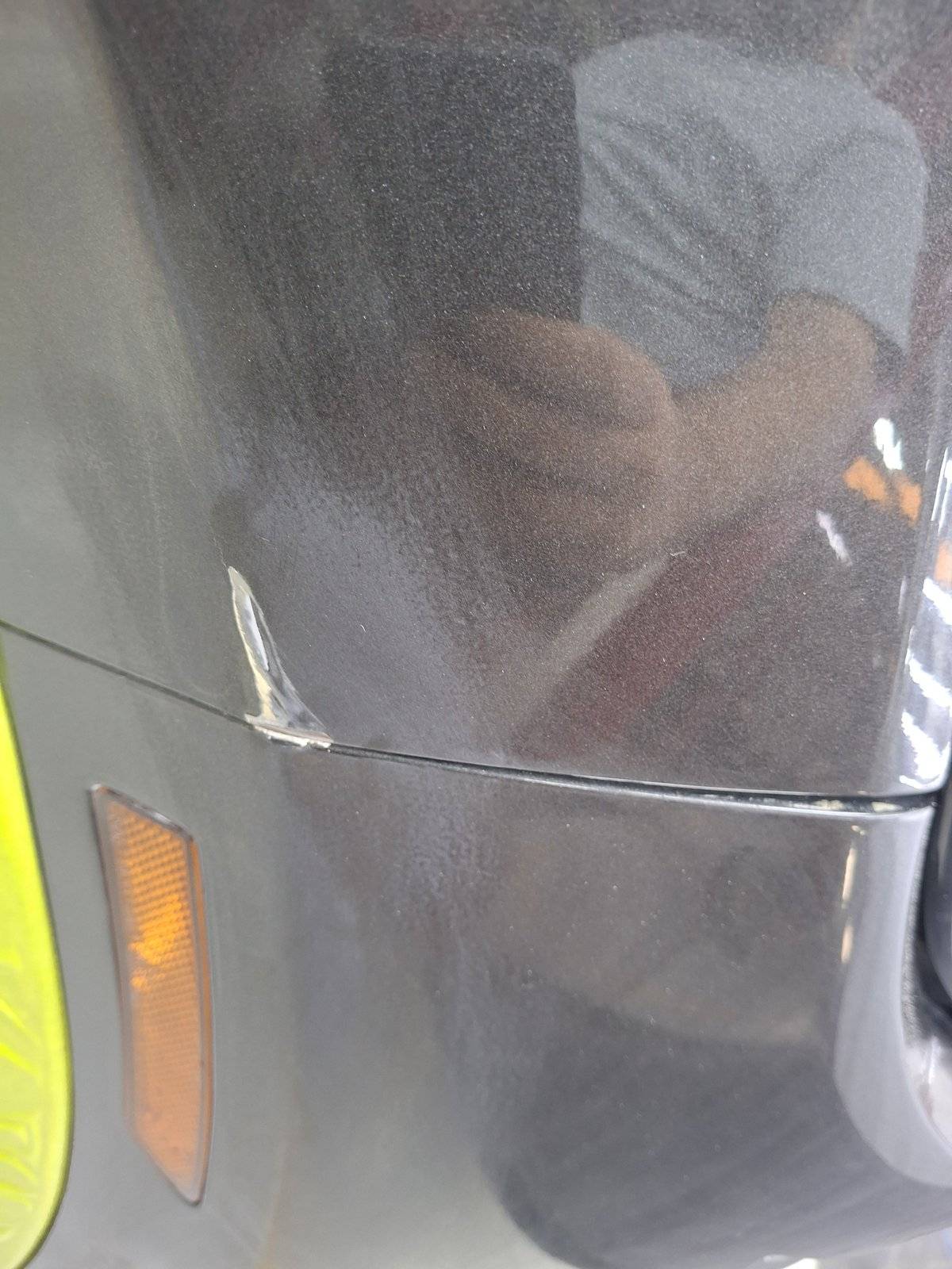 Primer and filler stage on a repaired body panel at Velokar Dubai