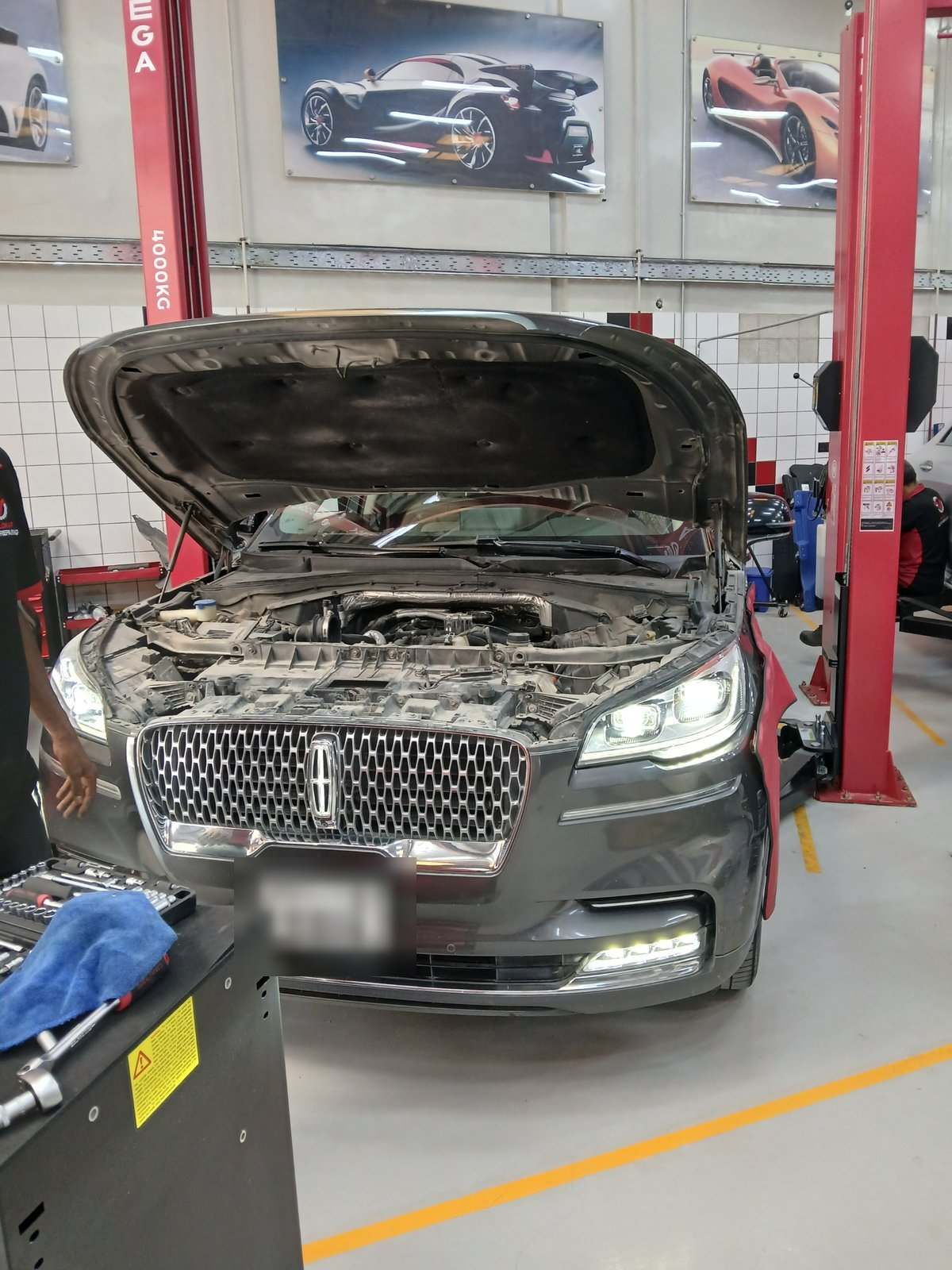 Lincoln Aviator with hood open in the Velokar workshop in Al Quoz, Dubai