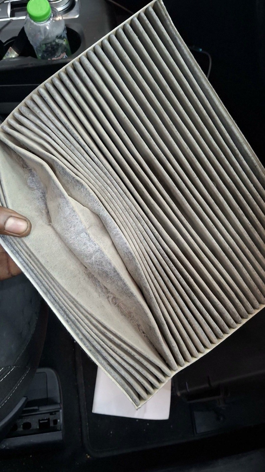 Clogged cabin air filter removed from a Ford Escape at Velokar in Al Quoz